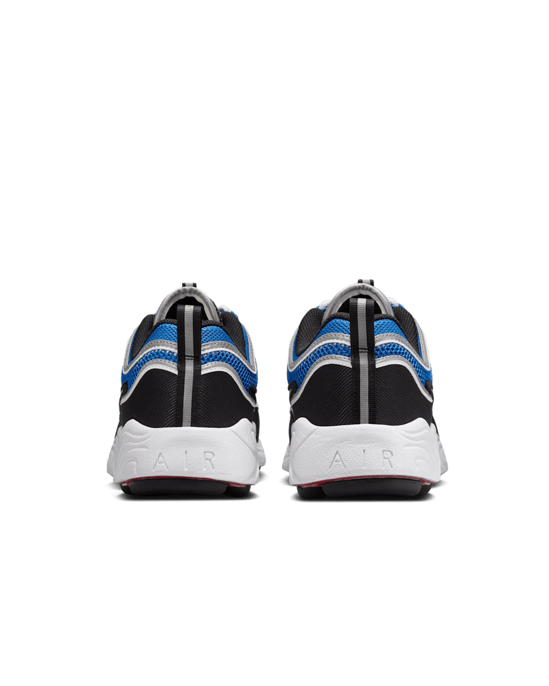 Air Zoom Spiridon sneakers with black, Signal Blue, and University Red colorway, reflective piping, and breathable mesh upper.