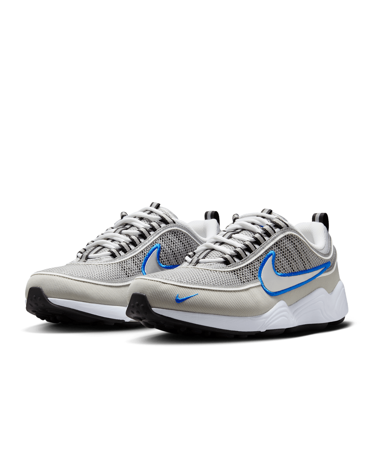Air Zoom Spiridon retro sneaker with reflective design piping, airy mesh upper, full-length Air Zoom cushioning, and Metallic Silver and Signal Blue colorway.