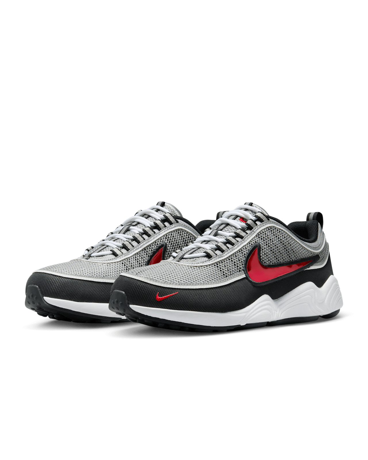 Nike Air Zoom Spiridon sneaker with reflective piping, airy mesh, Metallic Silver and Sport Red accents, and full-length Air Zoom cushioning.