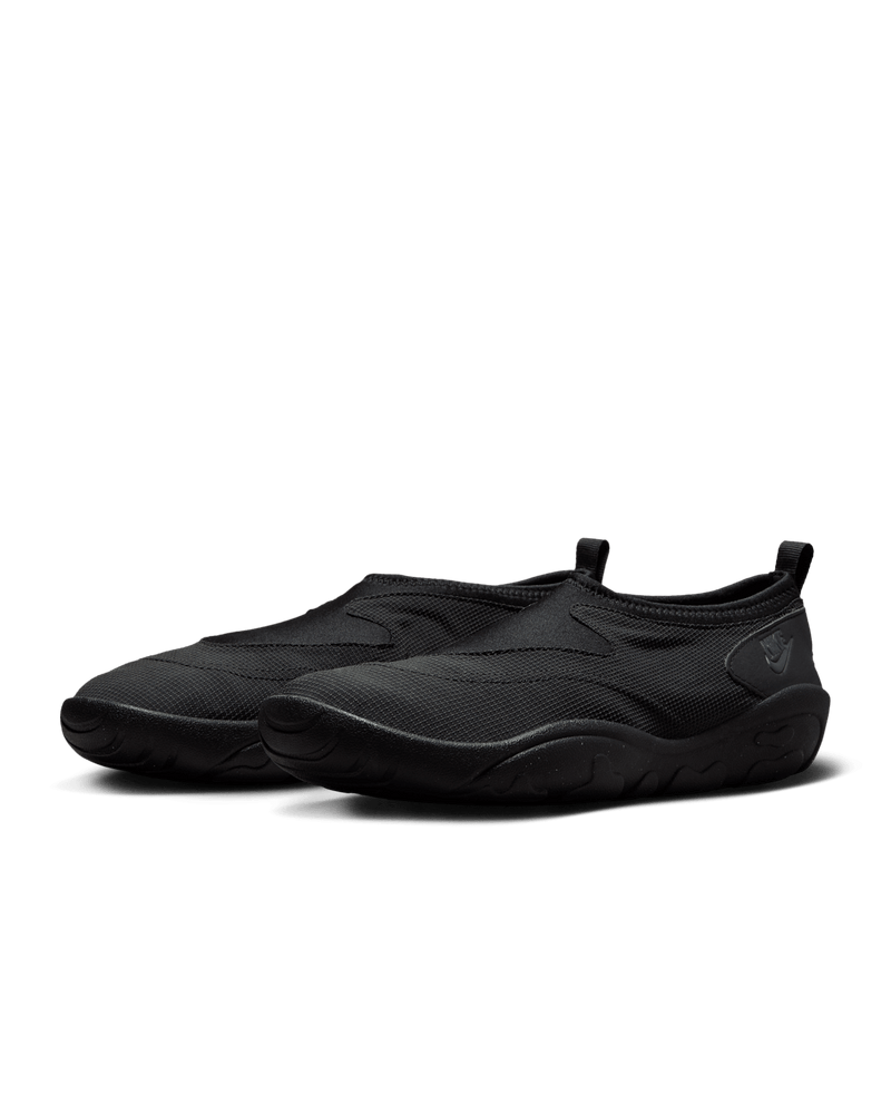 Aqua Turf sneakers in black and Off-Noir with stretchy textile upper and full-length rubber outsole, designed for water-friendly traction.