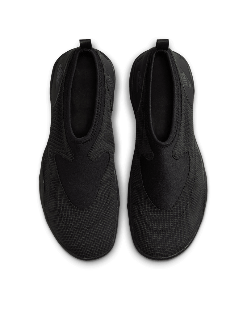 Aqua Turf sneakers in black and Off-Noir with stretchy textile upper and full-length rubber outsole, designed for water-friendly traction.