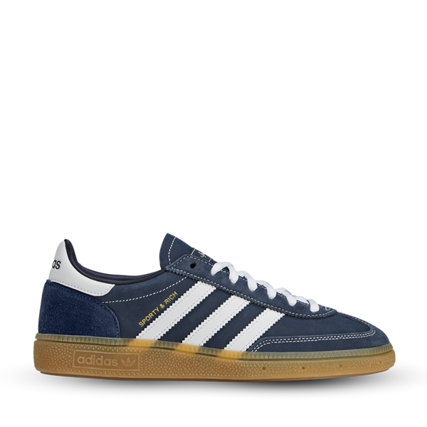 Sporty & Rich x adidas Handball Spezial with a smooth leather upper, rubber outsole, and retro-inspired minimalist design.