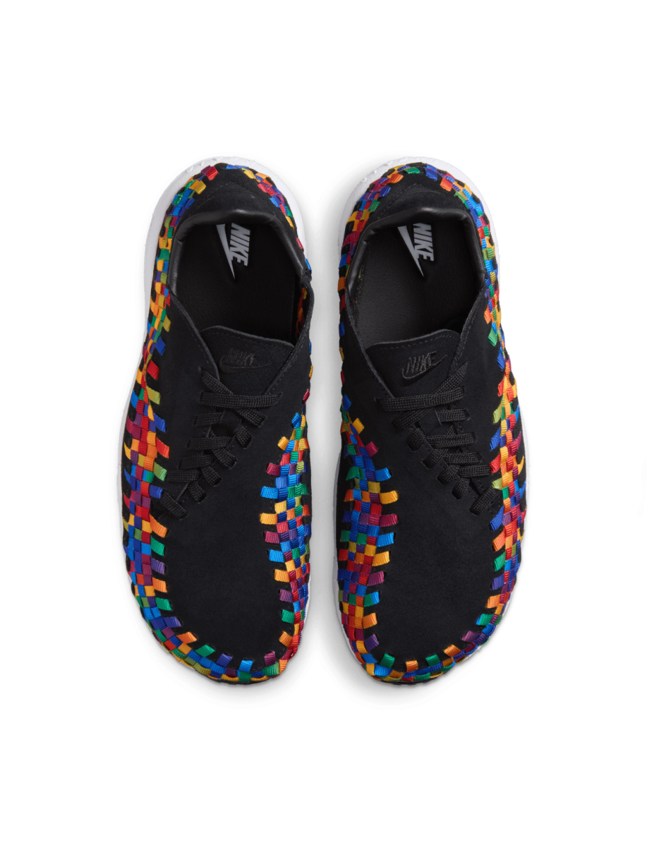 Comfy classic Footscape in vibrant colorway, showcasing wide toe box and asymmetrical woven details on black suede upper.