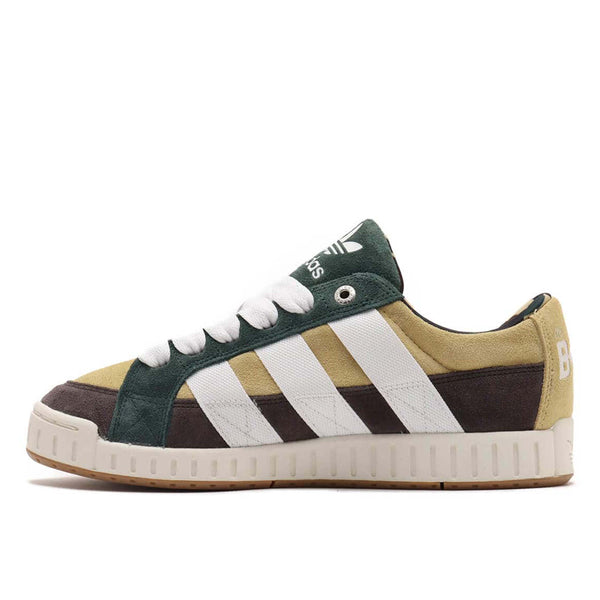 BAPE x adidas 30th Anniversary city sneaker with leather upper, rubber outsole, and hidden pocket in the shoe tongue.