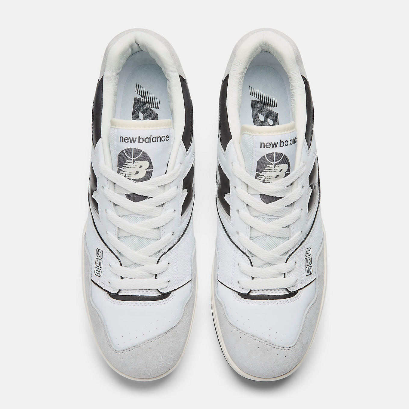 New Balance 550 sneakers in a classic leather low-top silhouette inspired by 1989 basketball heritage