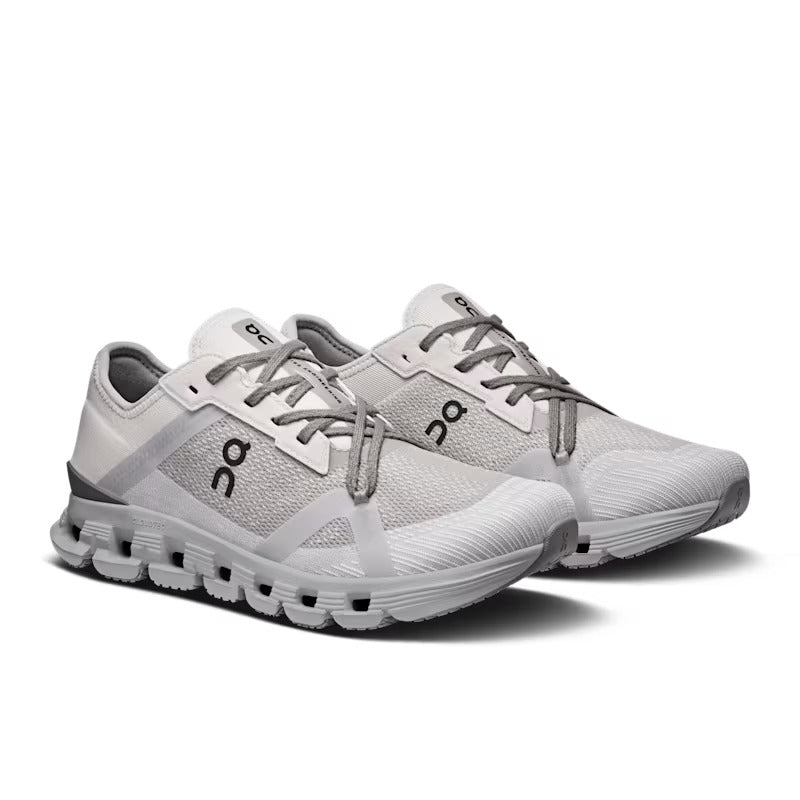 Cloud X 4 shoe with a sleek design, featuring a flexible sole and cushioned interior, perfect for both gym and studio activities. 