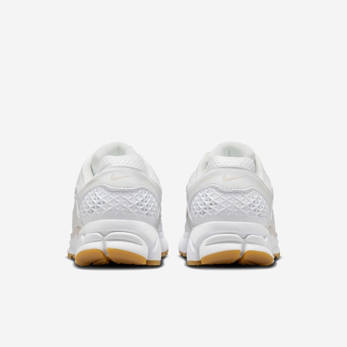 Nike Zoom Vomero 5 sneaker with layered textile and synthetic leather upper in a modern streetwear design