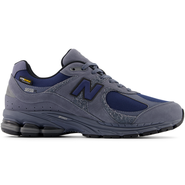 Unisex New Balance shoes with premium leather, mesh, and Cordura® fabric upper, featuring ABZORB insole and N-Durance rubber outsole for durability and cushioning.