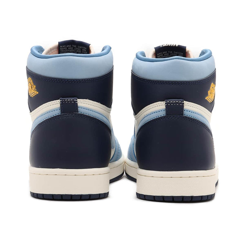 AJ1 'First in Flight' edition with University Blue, Midnight Navy, and Sail upper, accented with University Gold, celebrating aviation history