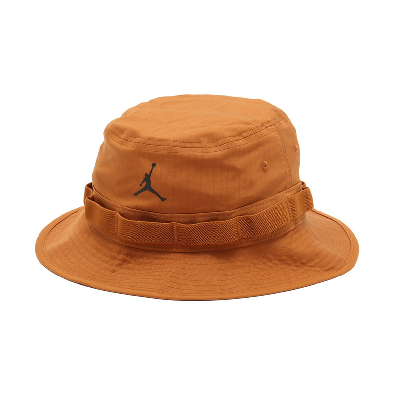 Versatile bucket hat with graphic webbing and Jumpman logo, featuring adjustable toggle closure.