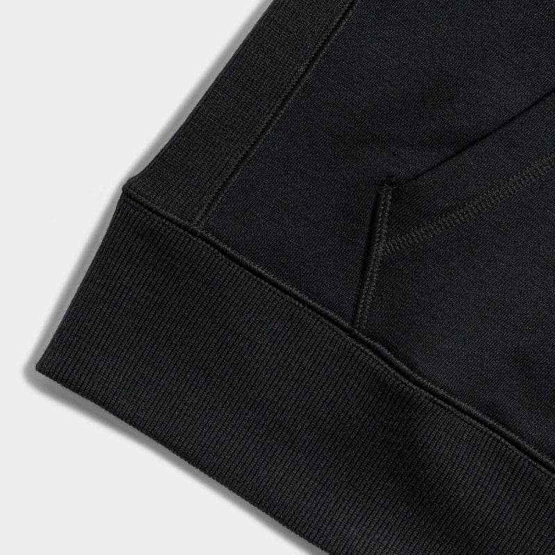 Premium hoodie made from wool and cotton, featuring a soft touch, relaxed fit, and tonal branding for effortless styling.


