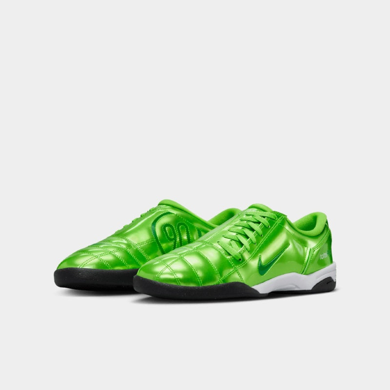 Nike Total 90 sneaker with futuristic design inspired by soccer cleats, featuring sleek lines and street-ready detailing