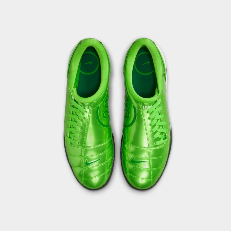 Nike Total 90 sneaker with futuristic design inspired by soccer cleats, featuring sleek lines and street-ready detailing