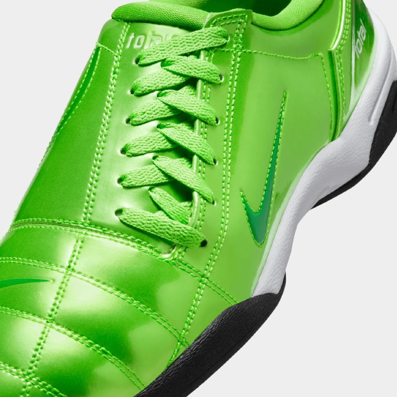 Nike Total 90 sneaker with futuristic design inspired by soccer cleats, featuring sleek lines and street-ready detailing