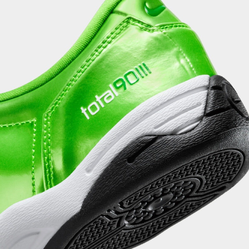Nike Total 90 sneaker with futuristic design inspired by soccer cleats, featuring sleek lines and street-ready detailing
