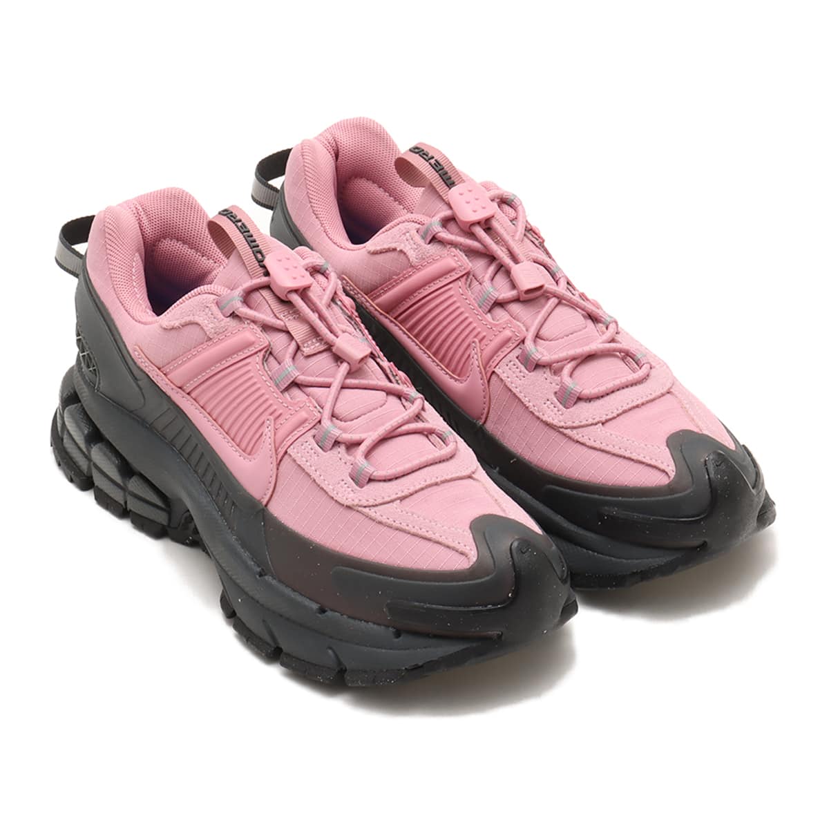 Nike Zoom Vomero 5 winter edition with water-repellent fabric, rubber mudguard, adjustable lace toggles, and cushioned midsole for all-weather comfort.