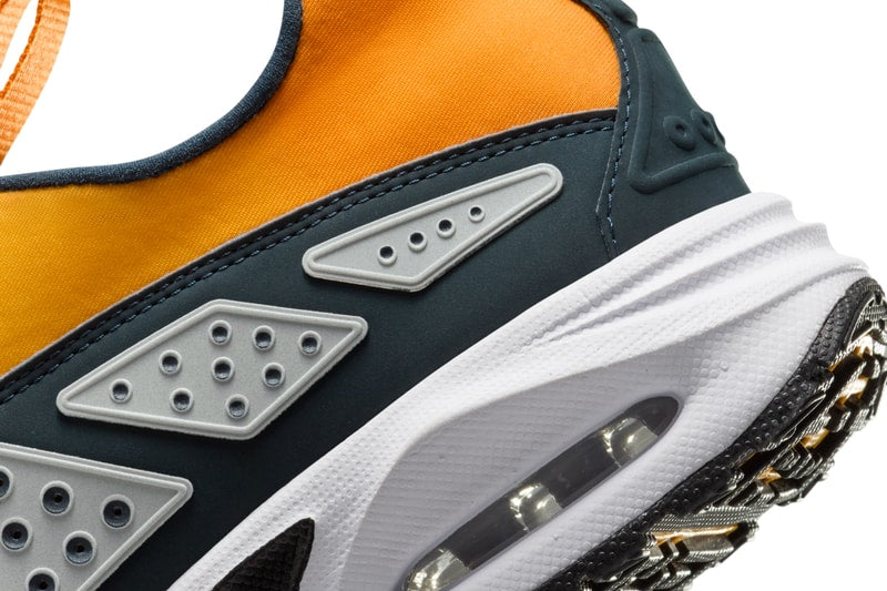 Air Sunder Max in Deep Ocean/Gold/Deep Yellow colorway with zip-up body, neoprene and tech-fabric upper, textured panels, and subtle Nike Swoosh near zip closure