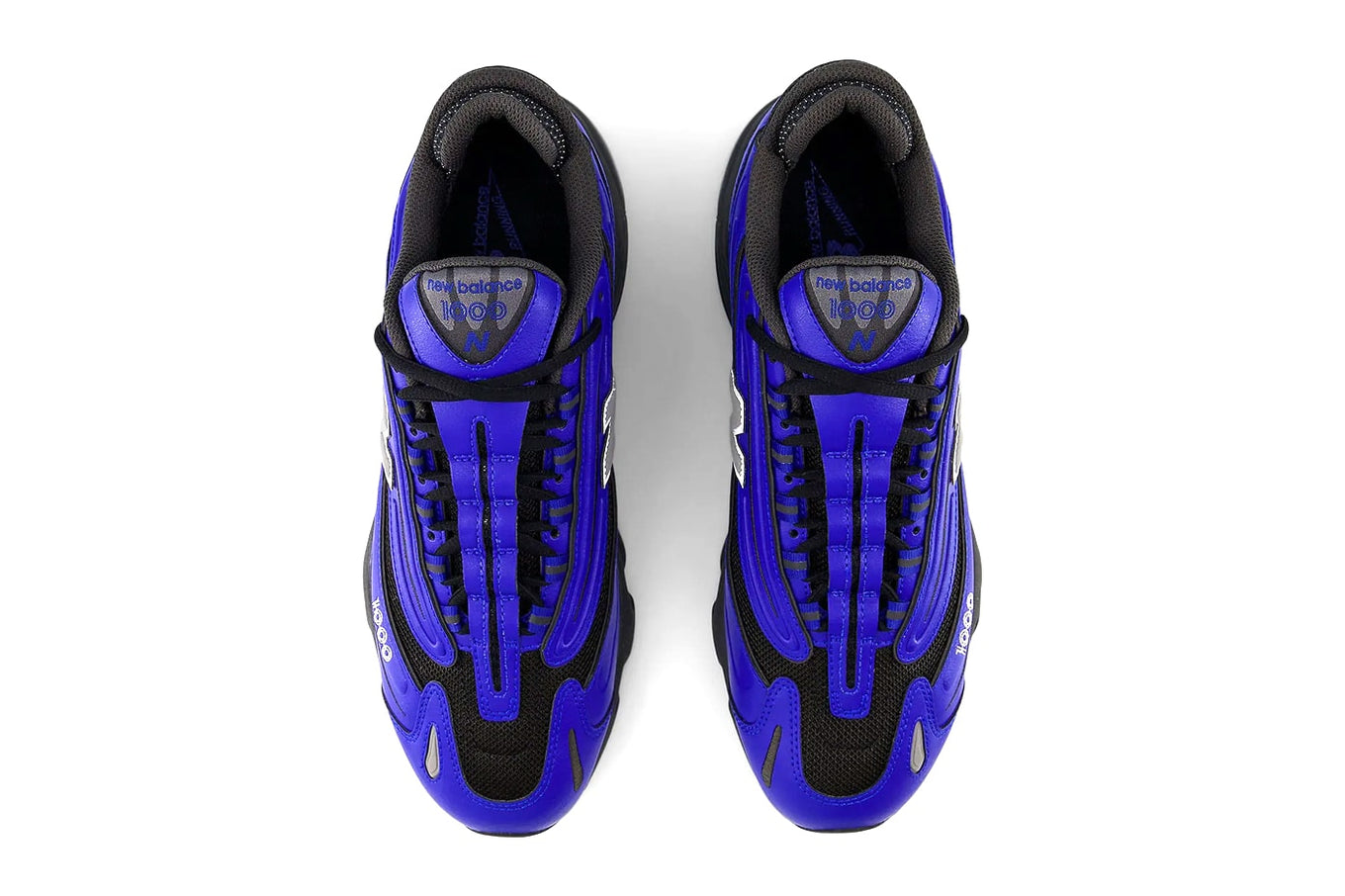 New Balance 1000 sneaker with mesh and leather upper, ABZORB cushioning, and retro chunky sole in Y2K-inspired design