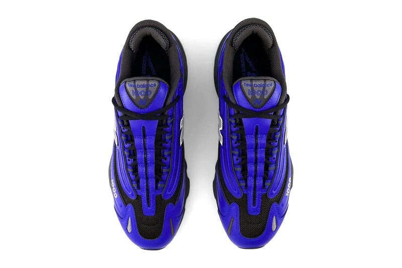 New Balance 1000 sneaker with mesh and leather upper, ABZORB cushioning, and retro chunky sole in Y2K-inspired design