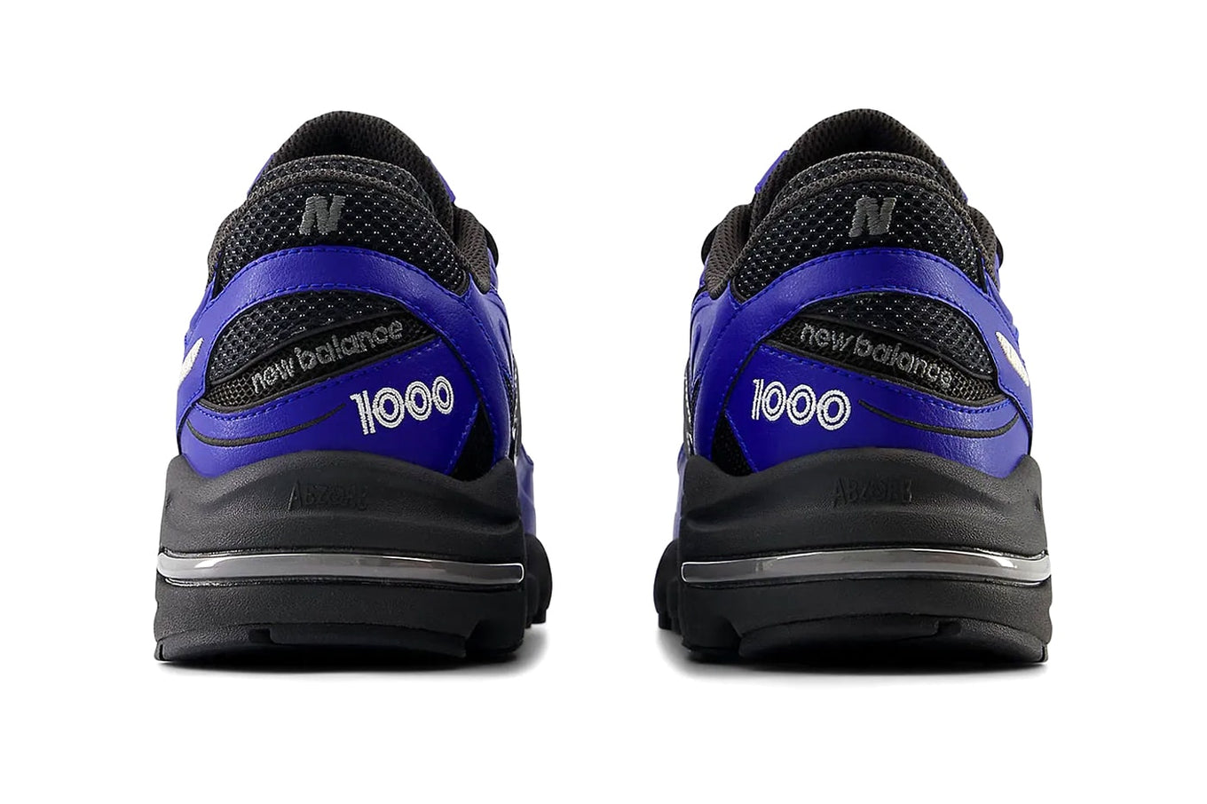 New Balance 1000 sneaker with mesh and leather upper, ABZORB cushioning, and retro chunky sole in Y2K-inspired design