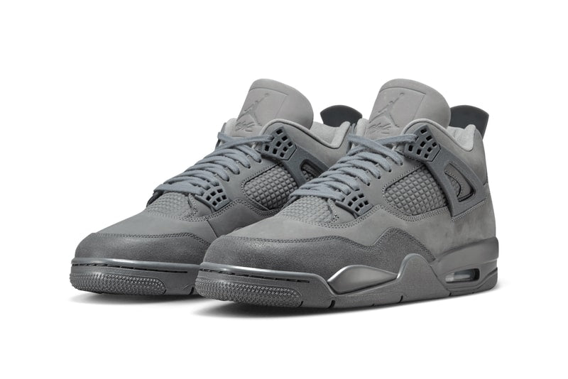 AJ4 'Wet Cement' sneaker in grey with nubuck leather and suede, inspired by Parisian cobblestone streets. The shoe showcases a rustic yet refined look, suitable for any urban setting.