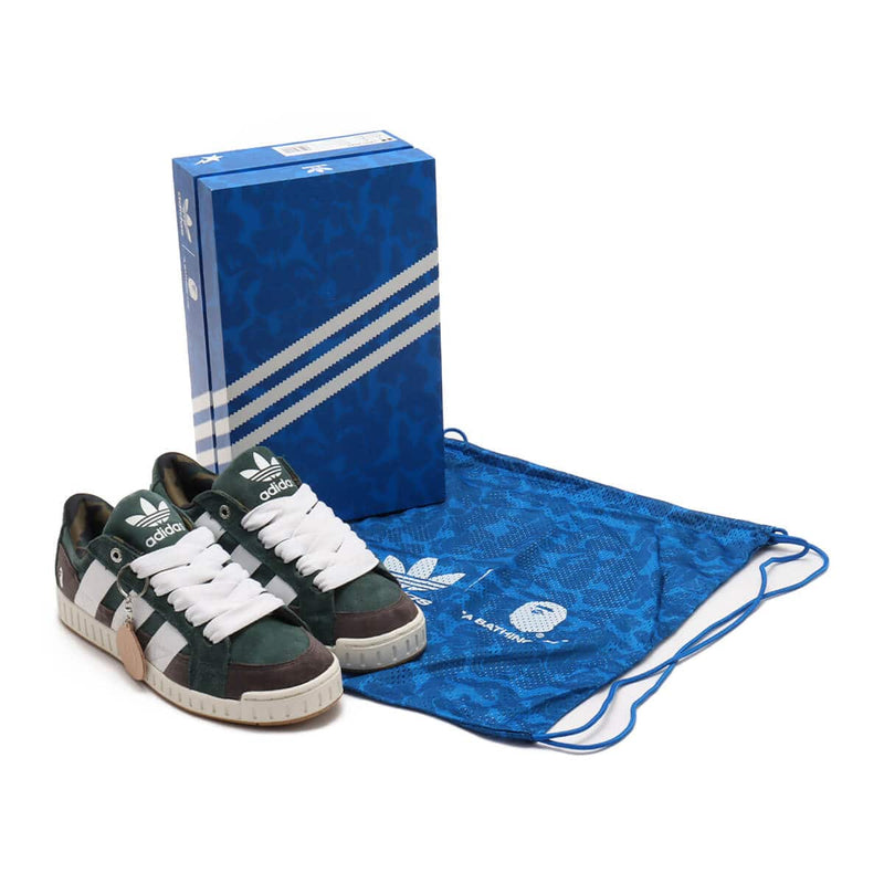 BAPE x adidas 30th Anniversary city sneaker with leather upper, rubber outsole, and hidden pocket in the shoe tongue.