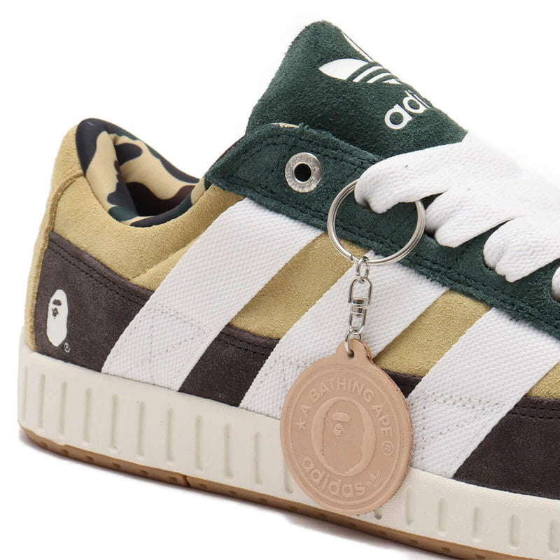 BAPE x adidas 30th Anniversary city sneaker with leather upper, rubber outsole, and hidden pocket in the shoe tongue.