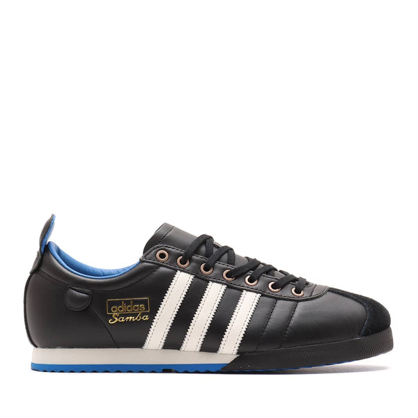 adidas Samba 62 Shoes with a leather upper, rubber toe bumper, wedge sole, and jagged 3-Stripes, inspired by 1960s football heritage.