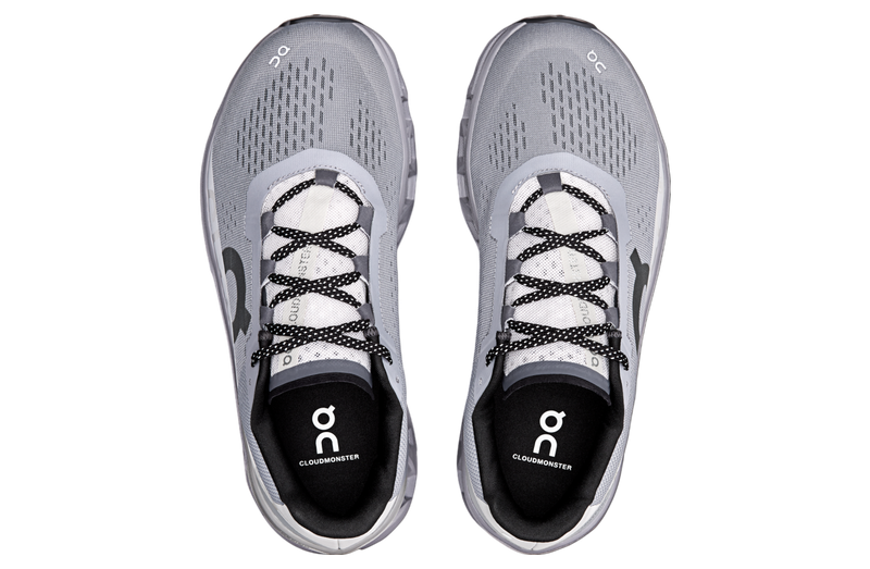 On Cloudmonster Alloy/Silver running shoe with CloudTec cushioning for long-distance runners.