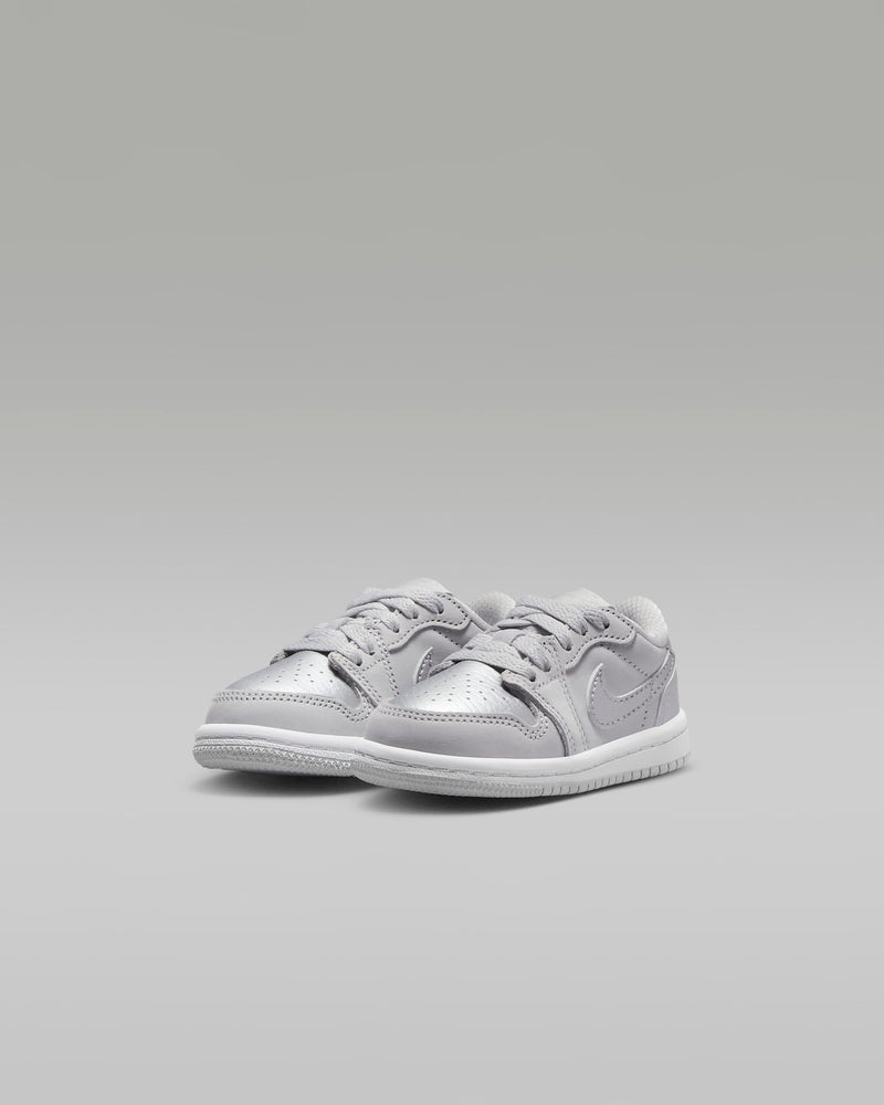 Every Jordan Retro is a classic sneaker done up in new colors and textures for a fresh look. With metallic silver leather, this iteration gives little feet stand-out style.