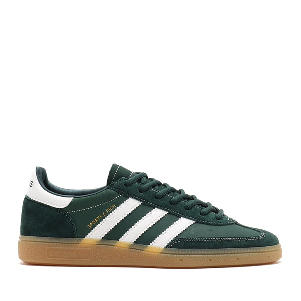 Handball Spezial x Sporty & Rich - Dark Green sneaker with premium suede upper, white 3-Stripes, gold-foil branding, and gum rubber outsole.