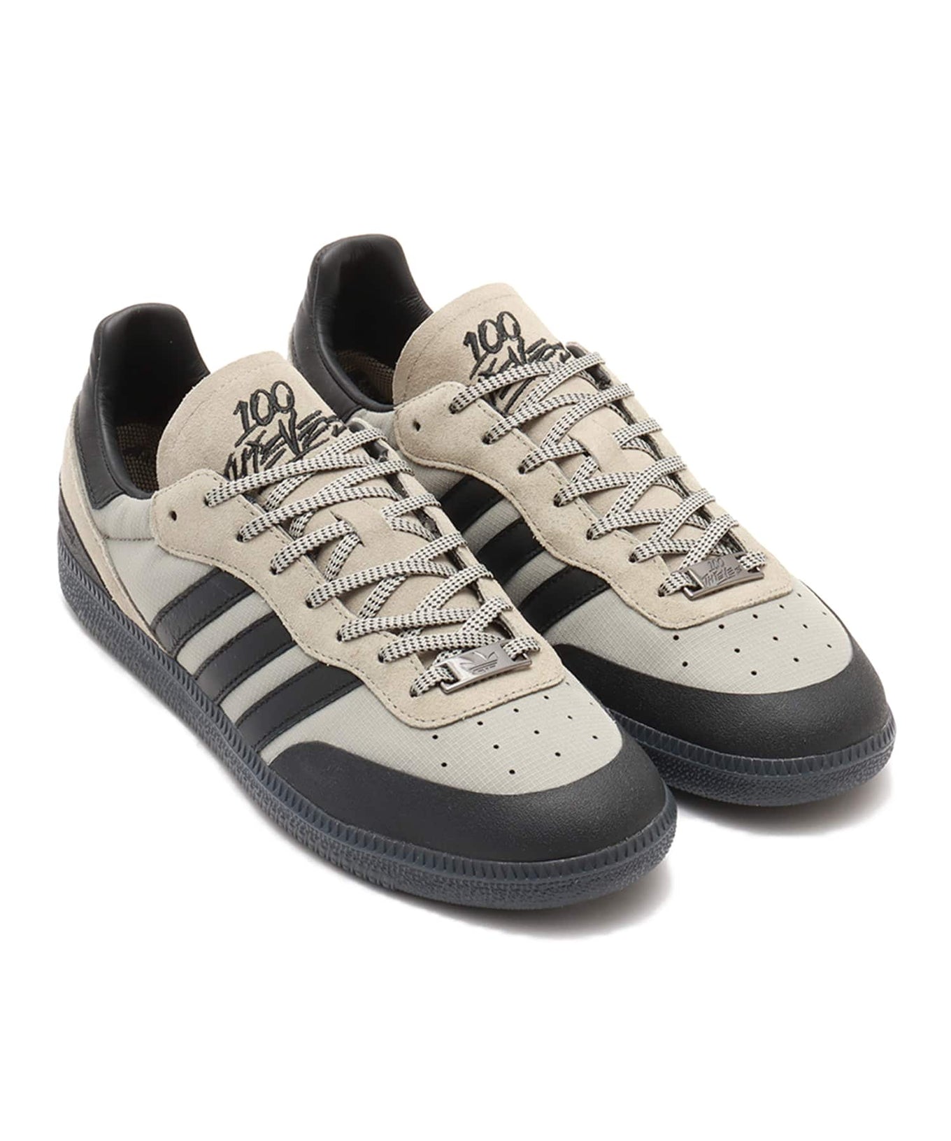 adidas x 100 Thieves Palos Hills shoes with ripstop upper, rubber toe and heel overlays, and suede accents inspired by outdoor style