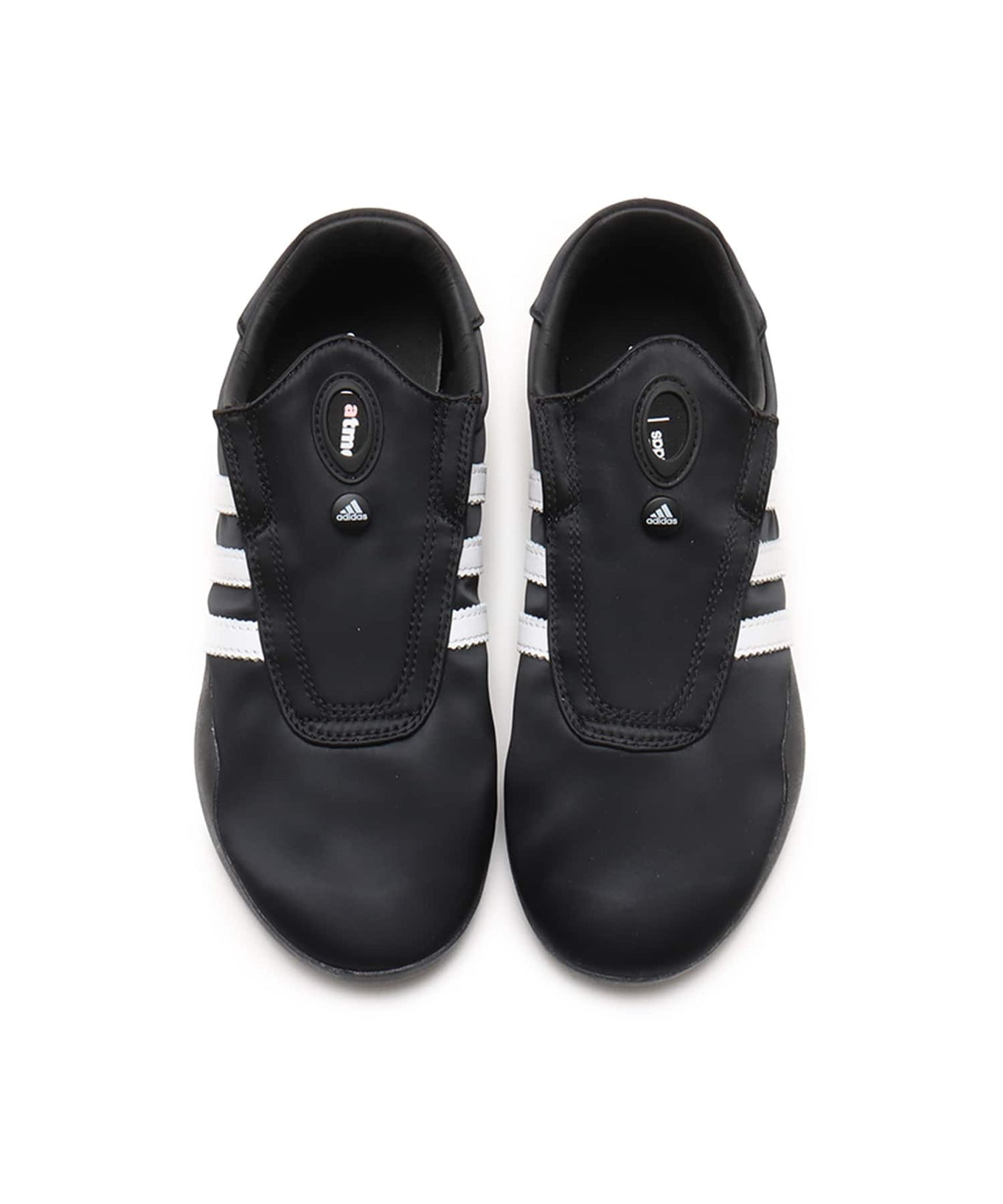 adidas Taekwondo May x atmos pink with satin upper, white leather stripes, removable bow, and "Designed in Tokyo" label