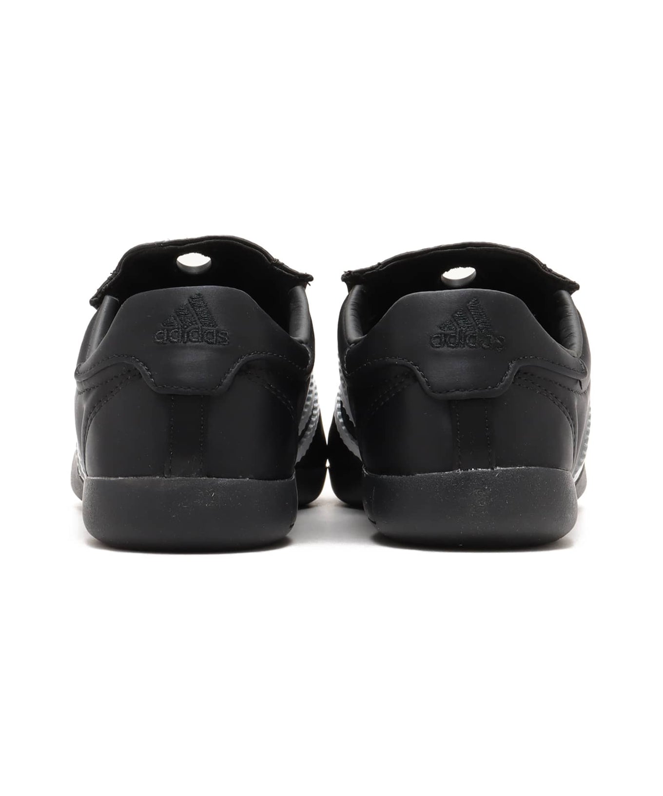 adidas Taekwondo May x atmos pink with satin upper, white leather stripes, removable bow, and "Designed in Tokyo" label