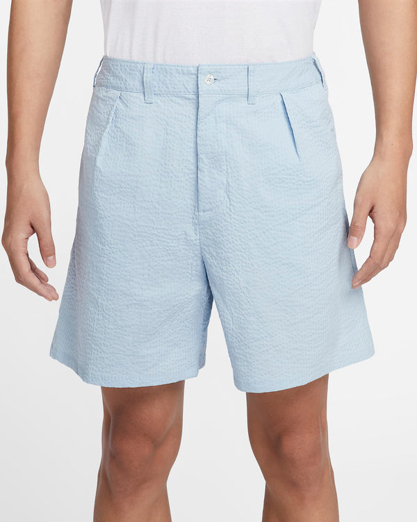 Durable and stylish, Nike Life collection presents these crisp, lightweight seersucker shorts featuring a subtle texture and front pleats for a polished look.