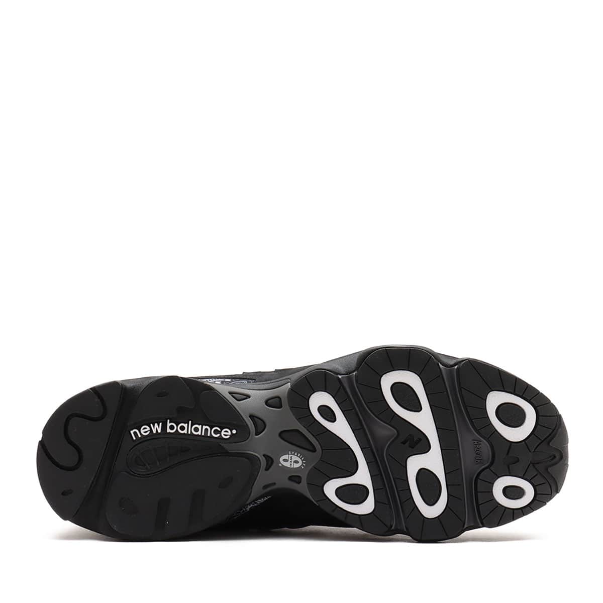 atmos x New Balance M1000 sneakers in black nubuck with bandana pattern details and monochrome color scheme