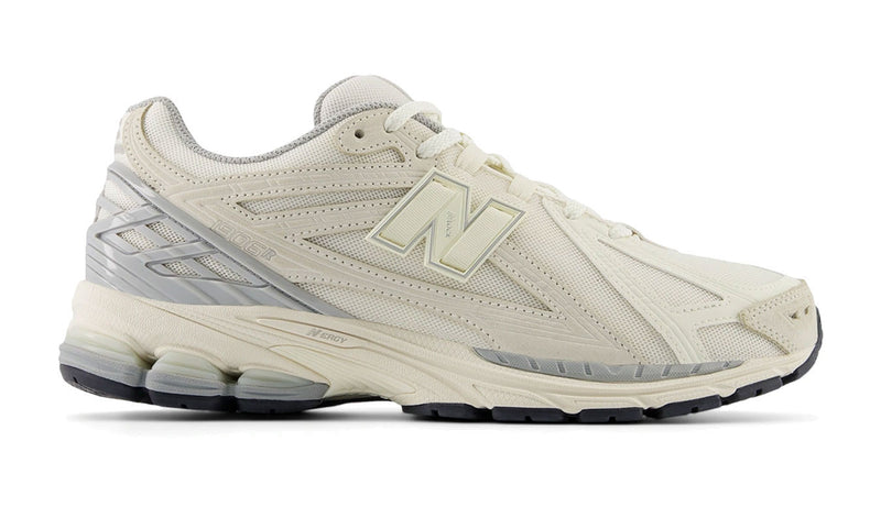 New Balance M1906U shoes with mesh and leather upper, featuring N-Durance rubber sole, N-Ergy cushioning, and Stability Web support.


