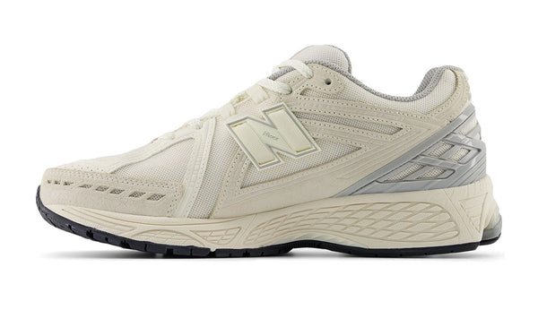 New Balance M1906U shoes with mesh and leather upper, featuring N-Durance rubber sole, N-Ergy cushioning, and Stability Web support.


