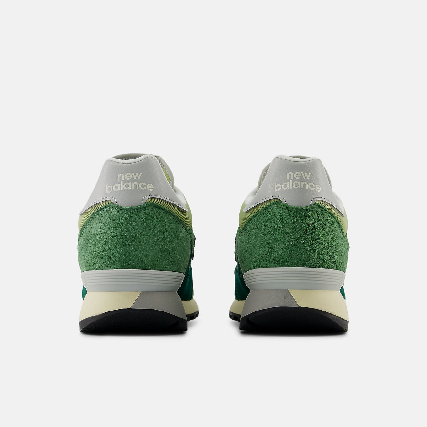 New Balance 475 sneaker from 1986 with suede and leather overlays, classic mesh base, lugged outsole, and reflective detailing.