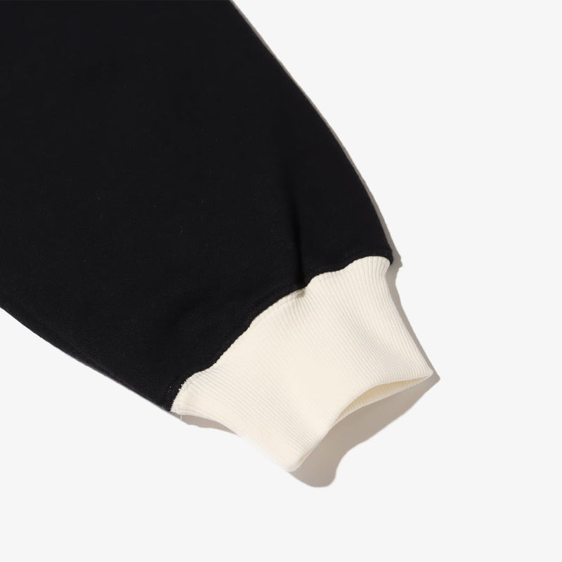Ringer sweatshirt with contrast ribbing and foam-printed ATMOS TOKYO logo. 