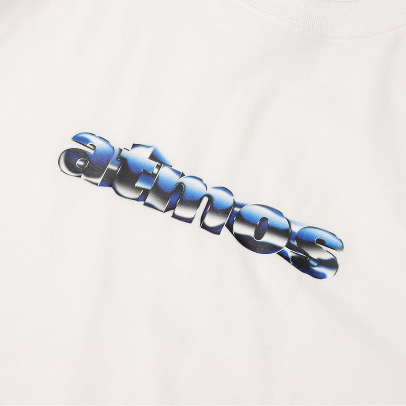 Short-sleeved T-shirt with metallic rubber-printed atmos logo, soft fabric, relaxed fit, and pin tag on left hem.