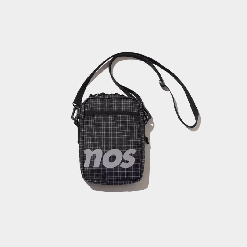 Mini shoulder bag made from durable grid nylon fabric with partition and zipper pockets, featuring a reflective atmos motif for style and nighttime visibility.