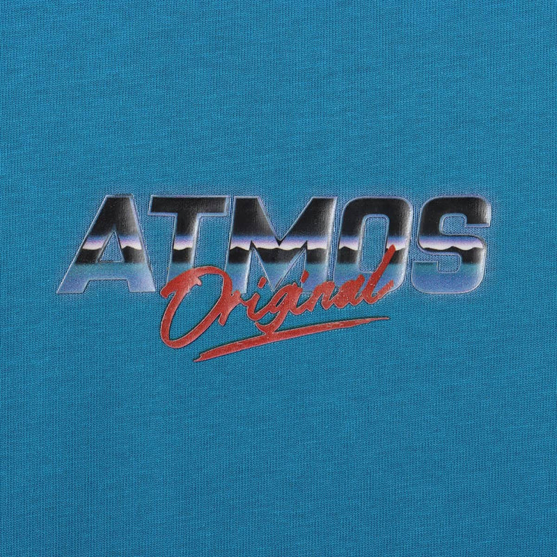 Short-sleeve T-shirt with a textured jersey fabric and a 1990s-inspired electronics graphic design, featuring inkjet and gel printing techniques. 