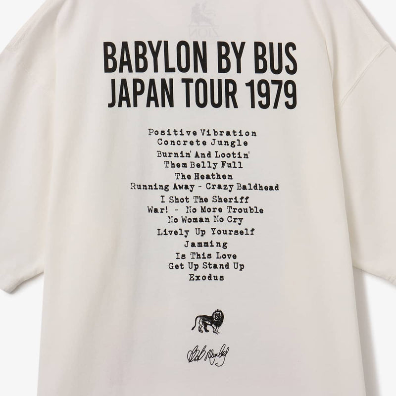 Bob Marley x Atmos T-shirt inspired by his 1979 Nakano Sun Plaza live performance, featuring 1970s-style Jamaican concert flyer design on the front and setlist from the show on the back.