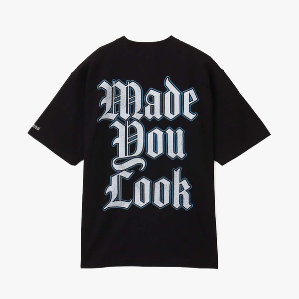 Nas x atmos "God's Son" T-shirt featuring artwork from Nas's 2002 album and the track title "Made You Look" on the back. 