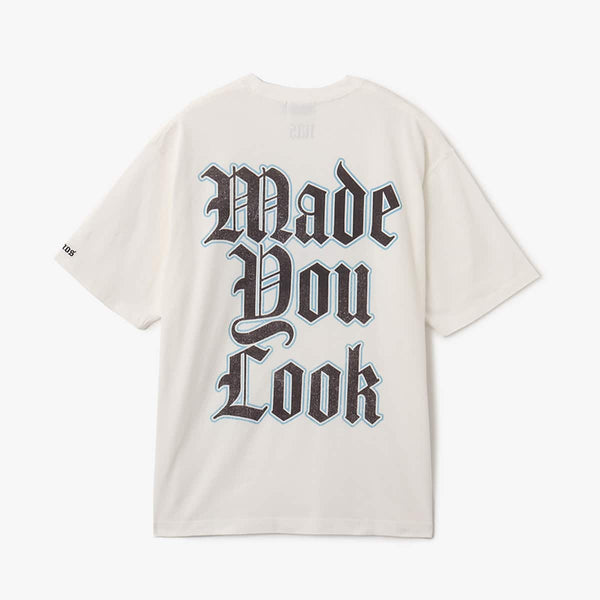 Nas x atmos "God's Son" T-shirt featuring artwork from Nas's 2002 album and the track title "Made You Look" on the back.