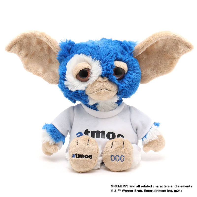 Limited edition Gizmo plush from GREMLINS, featuring atmos brand colors, removable T-shirt, embroidered logos, and serial number, celebrating the 40th anniversary of the film.


