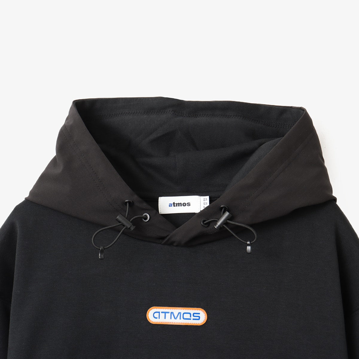 Knit hoodie with a two-layered design, atmos motif, and fabric accents. Soft, stretchy, and lightweight.