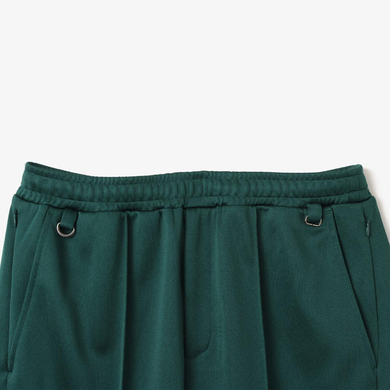 Men’s pin tuck trouser pants in Japanese Toray jersey with elastic waistband, bias pockets, and zippered back pocket