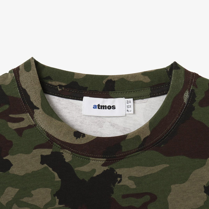 Classic atmos T-shirt with embroidered logo, blue pist tag on left hem, and thick 9-ounce American cotton fabric for a durable, textured feel. 